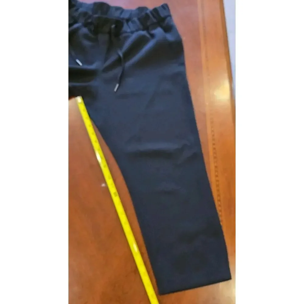 Lululemon On The Fly Black Drawstring Crop Pants Size 8 W6AVMS Athletic Casual